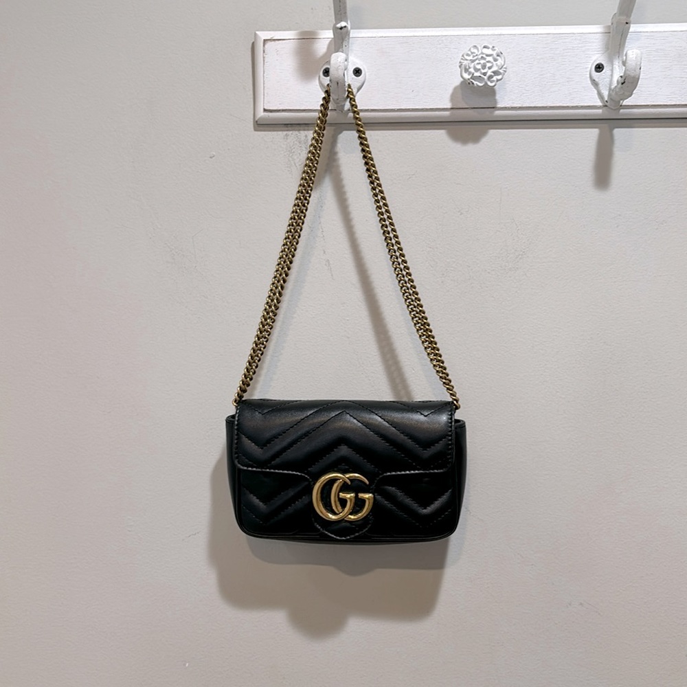 Authentic Gucci Black Supermini Lion Trap